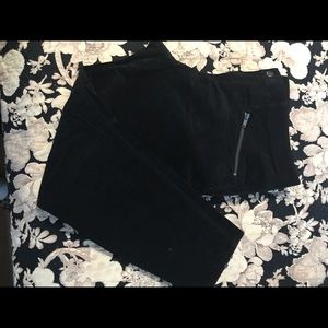 Black velvet skinny jeans.